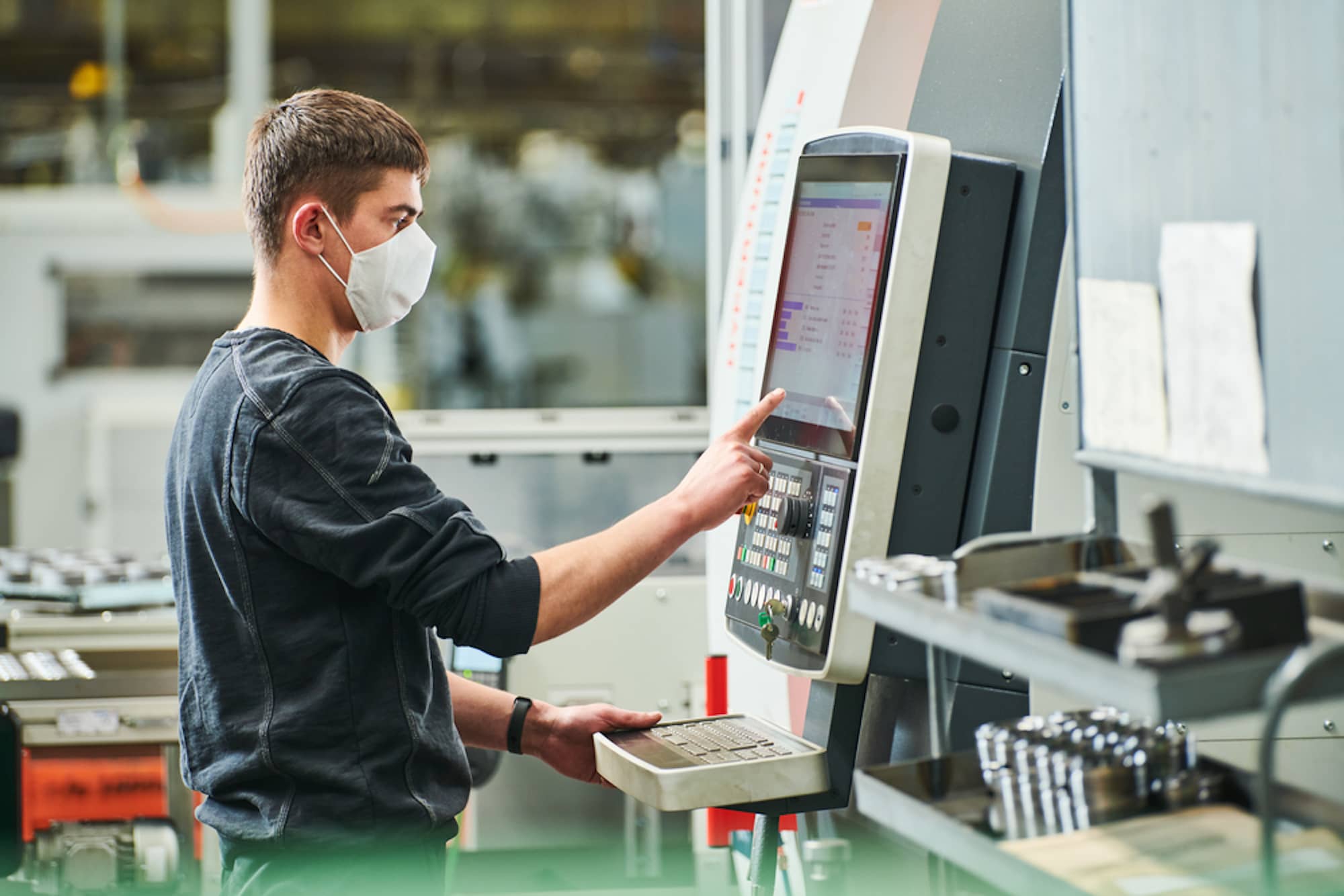 cnc machine engineer at screen