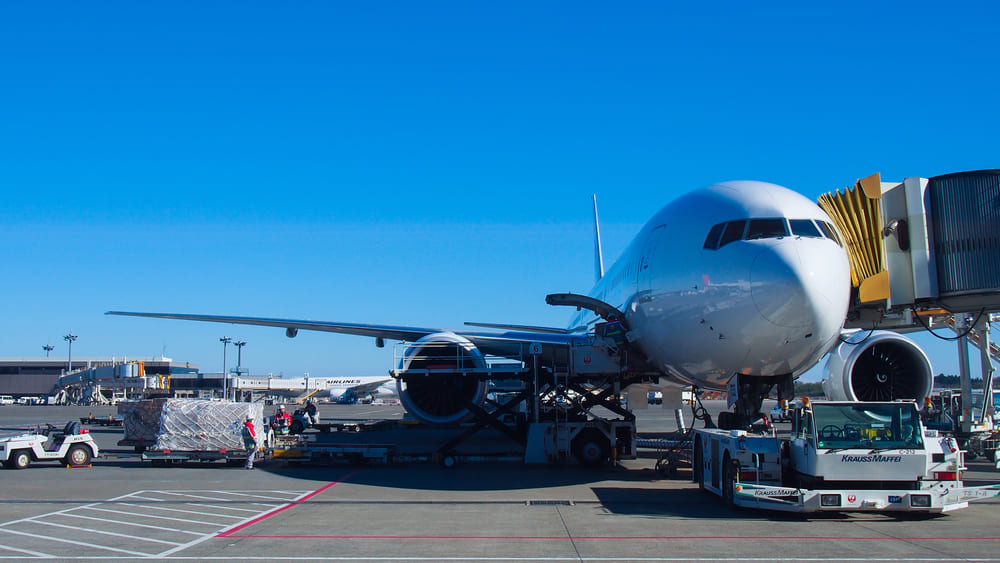 Loading white airplane 